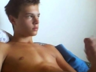 Hung twink shoots a load